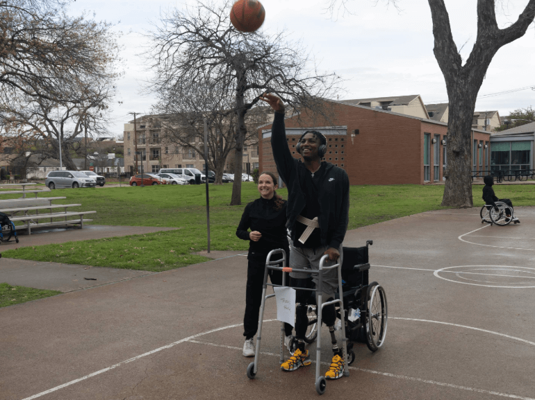 Travis Wilson shooting a basketball